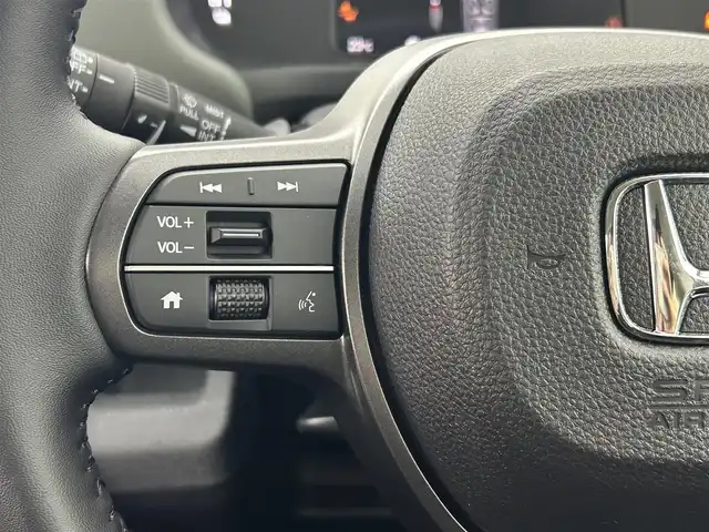 ホンダ フリード ハイブリット e:HEV クロスター 熊本県 2025(令7)年 0.1千km クリスタルブラックパール 登録済未使用車/純正9インチナビLXM-242ZFNI（ＡｐｐｌＣａｒＰｌａｙ・ＡｎｄｒｏｉｄＡｕｔｏ・ＢＴ・フルセグ・ＵＳＢ）/バックカメラ /ホンダセンシング/・レーダークルーズコントロール/・衝突軽減ブレーキ/・誤発進制御機能/後方誤発進抑制機能/・近距離衝突軽減ブレーキ/・歩行者事故低減ステアリング/・車線維持支援システム/・先行車発進お知らせ機能/・標識認識機能/横滑り防止/アイドリングストップ/ブラインドスポットモニター/パーキングアシスト/両側パワースライドドア　/前後クリアランスソナー　/前席シートヒーター/ブレーキホールド/電動パーキング/後席サーキュレーター/純正１５インチAW/オートライト/LEDヘッドライト/オートマチックハイビーム/フォグランプ/スマートキー/プッシュスタート/スペアキー1本/保証書/取扱説明書