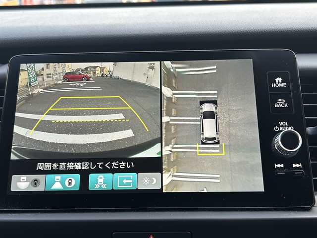 ホンダ フィット e:HEVホーム 富山県 2023(令5)年 0.7万km クリスタルブラックパール 登録時走行距離6143km/ワンオーナー/純正ナビ(TV/AM/FM/BT/USB/SD)/全方位カメラ/ビルトインETC2.0/ドライブレコーダー(前方)/LEDヘッドライト/オートライト/オートマチックハイビーム/衝突被害軽減ブレーキ/レーンキープアシスト/コーナーセンサー/レーダークルーズコントロール/純正フロアマット/ステアリングスイッチ/エンジンプッシュスタート/スマートキー/スペアキー/電動格納ミラー/ドアバイザー/保証書/取扱説明書