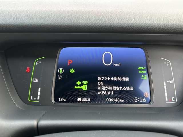 ホンダ フィット e:HEVホーム 富山県 2023(令5)年 0.7万km クリスタルブラックパール 登録時走行距離6143km/ワンオーナー/純正ナビ(TV/AM/FM/BT/USB/SD)/全方位カメラ/ビルトインETC2.0/ドライブレコーダー(前方)/LEDヘッドライト/オートライト/オートマチックハイビーム/衝突被害軽減ブレーキ/レーンキープアシスト/コーナーセンサー/レーダークルーズコントロール/純正フロアマット/ステアリングスイッチ/エンジンプッシュスタート/スマートキー/スペアキー/電動格納ミラー/ドアバイザー/保証書/取扱説明書