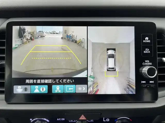 ホンダ フィット e:HEVホーム 富山県 2023(令5)年 0.7万km クリスタルブラックパール 登録時走行距離6143km/ワンオーナー/純正ナビ(TV/AM/FM/BT/USB/SD)/全方位カメラ/ビルトインETC2.0/ドライブレコーダー(前方)/LEDヘッドライト/オートライト/オートマチックハイビーム/衝突被害軽減ブレーキ/レーンキープアシスト/コーナーセンサー/レーダークルーズコントロール/純正フロアマット/ステアリングスイッチ/エンジンプッシュスタート/スマートキー/スペアキー/電動格納ミラー/ドアバイザー/保証書/取扱説明書