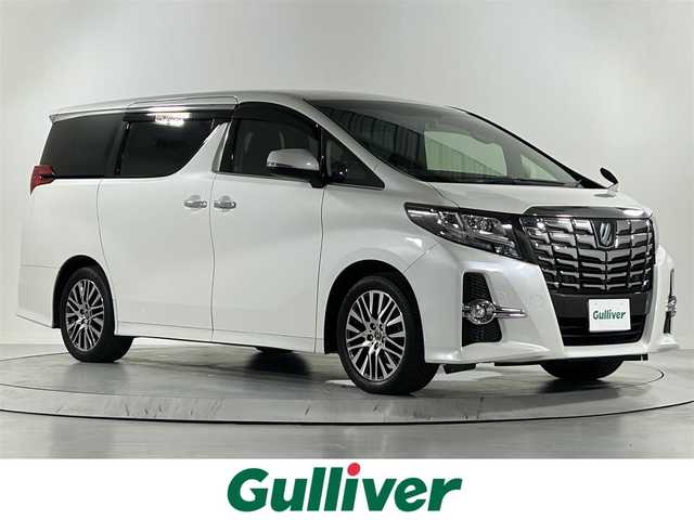 トヨタ アルファード S Cパッケージ 佐賀県 2016(平28)年 8.3万km ホワイトパールクリスタルシャイン アルパイン10インチナビ【EX10】/フルセグTV.CD.DVD.Bluetooth/アルパイン12.8インチフリップダウンモニター/衝突被害軽減システム/レーダークルーズコントロール/レーンアシスト/カーテンエアバッグ/クリアランスソナー/オートライト/バックカメラ/前後ドライブレコーダー/両側パワースライドドア/パワーバッグドア/ステアリングヒーター/運転席・助手席パワーシート/ハーフレザーシート/純正18インチアルミホイール/LEDヘッドライト/フォグライト/禁煙車