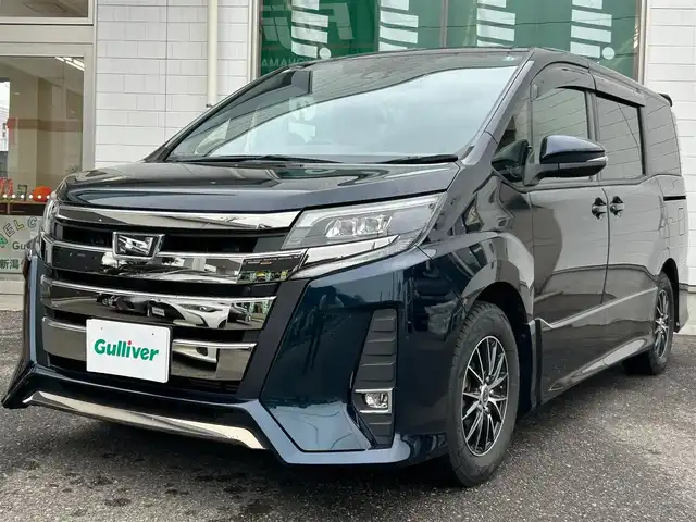 トヨタ ノア Si サイドリフトアップ 新潟県 2019(令1)年 4.1万km ブラッキッシュアゲハガラスフレーク メモリナビ/フルセグテレビ/バックカメラ/アイドリングストップ/クルーズコントロール/ドアバイザー/プッシュスタート/両側パワースライドドア/ETC/ドラレコ/純正フロアマット/純正ナビ/純正ホイール車載