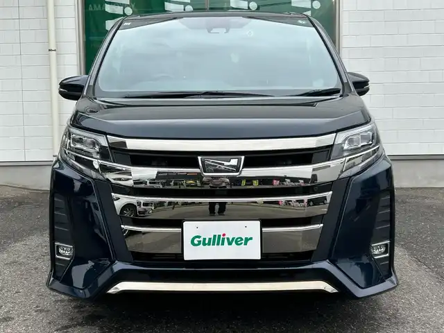 トヨタ ノア Si サイドリフトアップ 新潟県 2019(令1)年 4.1万km ブラッキッシュアゲハガラスフレーク メモリナビ/フルセグテレビ/バックカメラ/アイドリングストップ/クルーズコントロール/ドアバイザー/プッシュスタート/両側パワースライドドア/ETC/ドラレコ/純正フロアマット/純正ナビ/純正ホイール車載