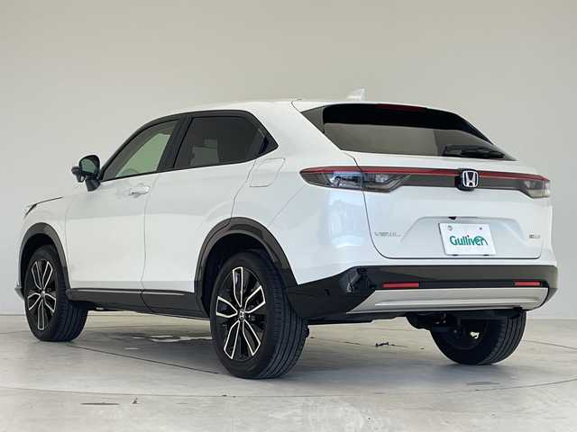 ホンダ ヴェゼル ハイブリッド e:HEV Z 愛知県 2024(令6)年 1.2万km プラチナホワイトパール 純正9型ナビ/レーダークルーズコントロール/シートヒーター/バックカメラ/電動リアゲート/コーナーセンサー/純正アルミホイール/ブラインドスポットモニター/LEDヘッドライト/パドルシフト/ステアリングヒーター/オートマチックハイビーム/ドライブレコーダー/ワイヤレス充電機/衝突軽減システム/フルセグ/Bluetooth/ステアリングスイッチ/スマートキー/プッシュスタート