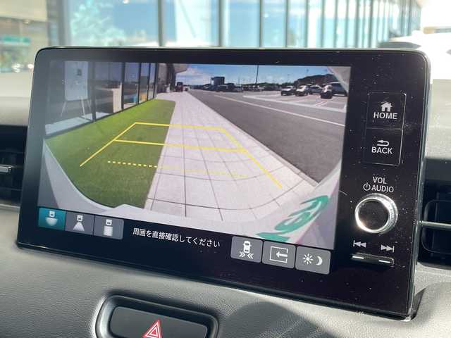 ホンダ ヴェゼル ハイブリッド e:HEV Z 愛知県 2024(令6)年 1.2万km プラチナホワイトパール 純正9型ナビ/レーダークルーズコントロール/シートヒーター/バックカメラ/電動リアゲート/コーナーセンサー/純正アルミホイール/ブラインドスポットモニター/LEDヘッドライト/パドルシフト/ステアリングヒーター/オートマチックハイビーム/ドライブレコーダー/ワイヤレス充電機/衝突軽減システム/フルセグ/Bluetooth/ステアリングスイッチ/スマートキー/プッシュスタート