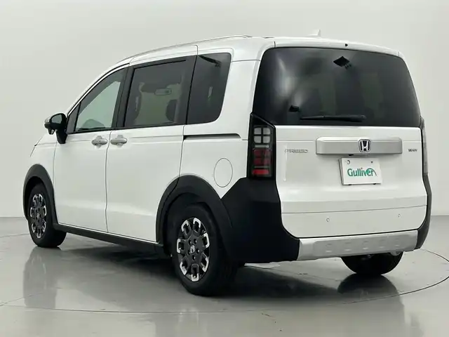 ホンダ フリード ハイブリット e:HEV クロスター 熊本県 2025(令7)年 0.1千km プラチナホワイトパール 登録済未使用車/純正9インチナビLXM-242ZFNI（ＡｐｐｌＣａｒＰｌａｙ・ＡｎｄｒｏｉｄＡｕｔｏ・ＢＴ・フルセグ・ＵＳＢ）/バックカメラ　/ホンダセンシング/・レーダークルーズコントロール/・衝突軽減ブレーキ/・誤発進制御機能/・後方誤発進抑制機能/・近距離衝突軽減ブレーキ/・歩行者事故低減ステアリング/・路外逸脱制御機能/・車線維持支援システム/・先行車発進お知らせ機能/・標識認識機能/横滑り防止/ブラインドスポットモニター/アイドリングストップ/両側パワースライドドア　/前後クリアランスソナー　/前席シートヒーター/ブレーキホールド/電子パーキング/後席サーキュレーター/純正１５インチAW/オートライト/オートマチックハイビーム/LEDヘッドライト/フォグランプ/スマートキー/プッシュスタート/スペアキー1本/保証書/取扱説明書