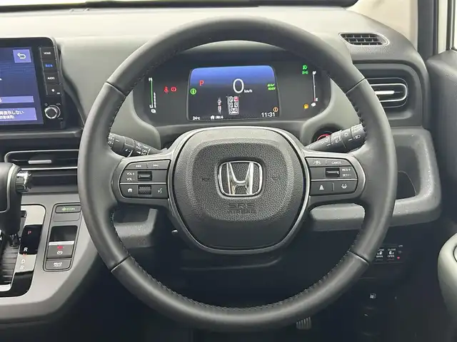 ホンダ フリード ハイブリット e:HEV クロスター 熊本県 2025(令7)年 0.1千km プラチナホワイトパール 登録済未使用車/純正9インチナビLXM-242ZFNI（ＡｐｐｌＣａｒＰｌａｙ・ＡｎｄｒｏｉｄＡｕｔｏ・ＢＴ・フルセグ・ＵＳＢ）/バックカメラ　/ホンダセンシング/・レーダークルーズコントロール/・衝突軽減ブレーキ/・誤発進制御機能/・後方誤発進抑制機能/・近距離衝突軽減ブレーキ/・歩行者事故低減ステアリング/・路外逸脱制御機能/・車線維持支援システム/・先行車発進お知らせ機能/・標識認識機能/横滑り防止/ブラインドスポットモニター/アイドリングストップ/両側パワースライドドア　/前後クリアランスソナー　/前席シートヒーター/ブレーキホールド/電子パーキング/後席サーキュレーター/純正１５インチAW/オートライト/オートマチックハイビーム/LEDヘッドライト/フォグランプ/スマートキー/プッシュスタート/スペアキー1本/保証書/取扱説明書