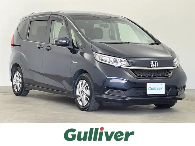 ホンダ フリード ハイブリット G ホンダセンシング 千葉県 2021(令3)年 4.2万km ミッドナイトブルービームM 禁煙車/純正メモリナビ/CD/DVD/BT/フルセグTV/後席モニター/両側パワースライドドア/ホンダセンシング/●衝突軽減ブレーキ〈CMBS〉/●誤発進抑制機能/●後方誤発進抑制機能/●歩行者事故低減ステアリング/●路外逸脱抑制機能/●ACC〈アダプティブ・クルーズ・コントロール〉/●LKAS〈車線維持支援システム〉/●オートハイビーム/●先行車発進お知らせ機能/●標識認識機能/ビルトインETC/バックカメラ/前席シートヒーター/スマートキー&プッシュスタート