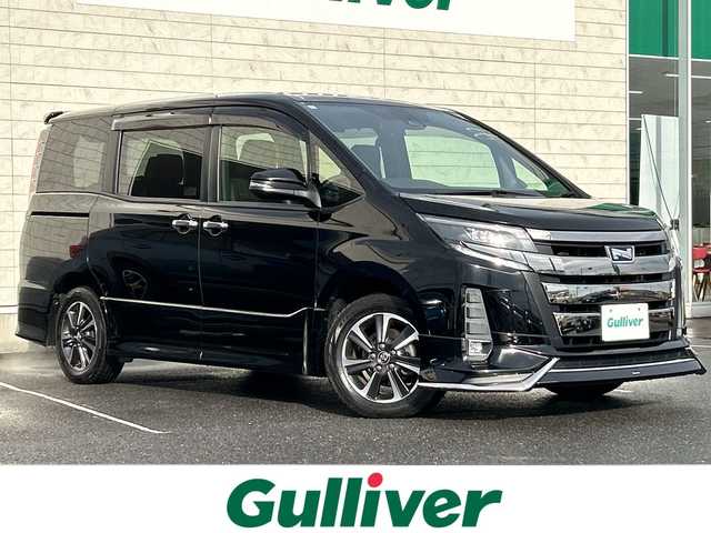 トヨタ ノア Si ダブルバイビー 茨城県 2018(平30)年 2.5万km ブラック モデリスタエアロ/ALPINE11型ナビ【EX11Z】/(地デジTV・CD・DVD・BT・ラジオ再生)/ALPINE12型フリップダウンモニター/両側パワースライドドア/プリクラッシュセーフティ/クルーズコントロール/レーンアシスト/バックカメラ/ビルトインETC/オートライト/LEDヘッドライト/純正16inアルミホイール/純正フロアマット/スマートキー/取扱説明書