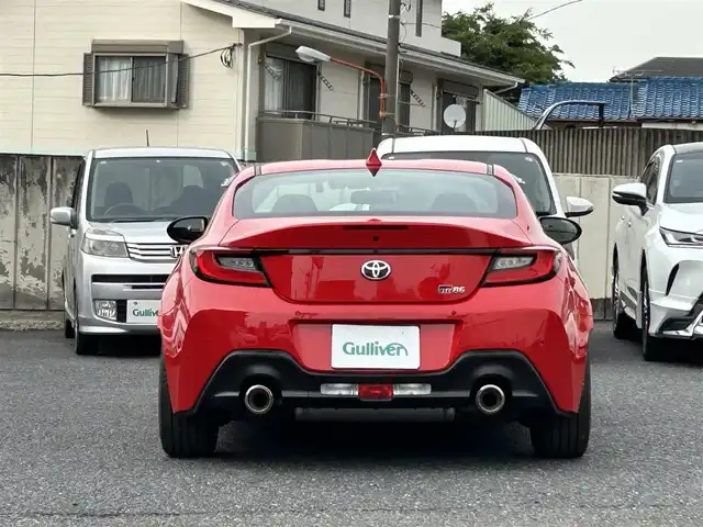 トヨタ ＧＲ８６ SZ 東京都 2025(令7)年 0.1万km 赤 走行距離814km/ワンオーナー/SD純正ナビ【NMZK-W73D】/（AM/FM/CD/DVD/BT/フルセグ）/アイサイトコアテクノロジー/・プリクラッシュブレーキ/・追従機能付きクルーズコントロール/・車線逸脱警報/・先行車発進お知らせ機能/・後退時ブレーキアシスト/バックカメラ/電動リアゲート/ヒルスタートアシスト/GRエンブレム付革巻きステアリングホイール/ETC/ドライブレコーダー/保証書/取扱説明書/スペアキー×1