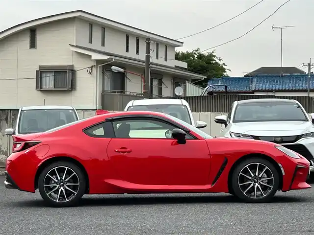 トヨタ ＧＲ８６ SZ 東京都 2025(令7)年 0.1万km 赤 走行距離814km/ワンオーナー/SD純正ナビ【NMZK-W73D】/（AM/FM/CD/DVD/BT/フルセグ）/アイサイトコアテクノロジー/・プリクラッシュブレーキ/・追従機能付きクルーズコントロール/・車線逸脱警報/・先行車発進お知らせ機能/・後退時ブレーキアシスト/バックカメラ/電動リアゲート/ヒルスタートアシスト/GRエンブレム付革巻きステアリングホイール/ETC/ドライブレコーダー/保証書/取扱説明書/スペアキー×1