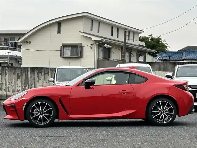 トヨタ ＧＲ８６ SZ 東京都 2025(令7)年 0.1万km 赤 走行距離814km/ワンオーナー/SD純正ナビ【NMZK-W73D】/（AM/FM/CD/DVD/BT/フルセグ）/アイサイトコアテクノロジー/・プリクラッシュブレーキ/・追従機能付きクルーズコントロール/・車線逸脱警報/・先行車発進お知らせ機能/・後退時ブレーキアシスト/バックカメラ/電動リアゲート/ヒルスタートアシスト/GRエンブレム付革巻きステアリングホイール/ETC/ドライブレコーダー/保証書/取扱説明書/スペアキー×1