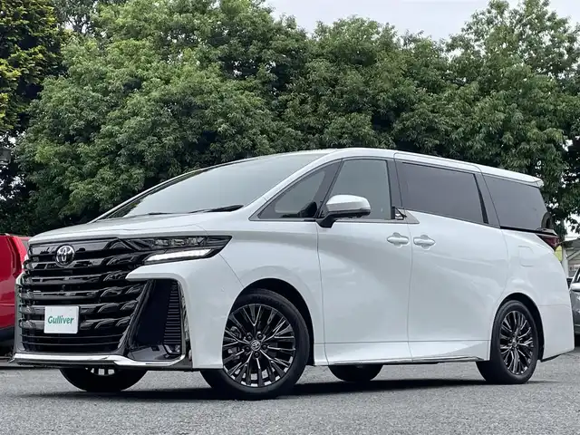 トヨタ ヴェルファイア ハイブリット Z プレミア 東京都 2024(令6)年 1.2万km プラチナホワイトパールマイカ ワンオーナー/寒冷地仕様/デジタルインナーミラー/スペアタイヤ/左右独立ムーンルーフ/14インチディスプレイオーディオ/コネクティッドナビ/フルセTV・Bluetoothオーディオ/フリップダウンモニター/三眼LEDヘッドランプ/ブラインドスポットモニター/トヨタチームメイト/パノラミックビューモニター/デュアルパワースライドドア/パワーバックドア/プレミアムナッパ本革シート(サンセットブラウン)/パワーシート/ヒーター/ベンチレーション/トヨタセーフティセンス