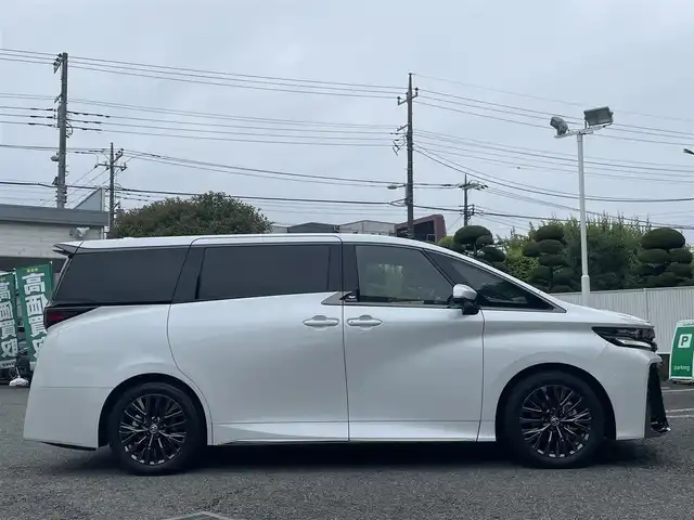 トヨタ ヴェルファイア ハイブリット Z プレミア 東京都 2024(令6)年 1.2万km プラチナホワイトパールマイカ ワンオーナー/寒冷地仕様/デジタルインナーミラー/スペアタイヤ/左右独立ムーンルーフ/14インチディスプレイオーディオ/コネクティッドナビ/フルセTV・Bluetoothオーディオ/フリップダウンモニター/三眼LEDヘッドランプ/ブラインドスポットモニター/トヨタチームメイト/パノラミックビューモニター/デュアルパワースライドドア/パワーバックドア/プレミアムナッパ本革シート(サンセットブラウン)/パワーシート/ヒーター/ベンチレーション/トヨタセーフティセンス