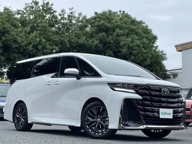 トヨタ ヴェルファイア ハイブリット Z プレミア 東京都 2024(令6)年 1.2万km プラチナホワイトパールマイカ ワンオーナー/寒冷地仕様/デジタルインナーミラー/スペアタイヤ/左右独立ムーンルーフ/14インチディスプレイオーディオ/コネクティッドナビ/フルセTV・Bluetoothオーディオ/フリップダウンモニター/三眼LEDヘッドランプ/ブラインドスポットモニター/トヨタチームメイト/パノラミックビューモニター/デュアルパワースライドドア/パワーバックドア/プレミアムナッパ本革シート(サンセットブラウン)/パワーシート/ヒーター/ベンチレーション/トヨタセーフティセンス
