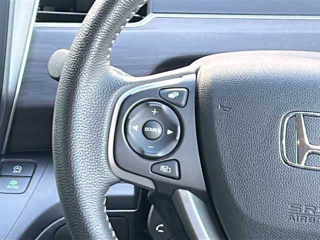 ホンダ フリード G 茨城県 2023(令5)年 1.5万km プレミアムクリスタルブルークリスタル 横滑り防止装置/レーンキープアシスト/オートライト/LEDヘッドライト/サイドエアバッグ/カーテンエアバッグ/衝突被害軽減システム/Bluetooth/USB入力端子/ETC/バックカメラ/フルセグTV/SDナビ/アイドリングストップ/スマートキー/冷房AAC/追従走行付クルーズコントロール/ドライブレコーダー/純正フロアマット/シートヒーター/両側パワースライドドア/15インチ純正アルミホイール