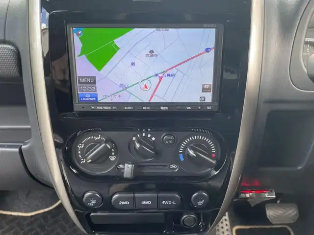 スズキ ジムニー ランドベンチャー 道央・札幌 2014(平26)年 8.7万km スチールシルバーM ワンオーナー/前席シートヒーター/純正メモリナビ/ワンセグTV/CD/純正１６インチアルミホイール/背面タイヤ/ハードカバー/キーレスキー/スペアキー１本/ETC/新車時保証書/取扱説明書