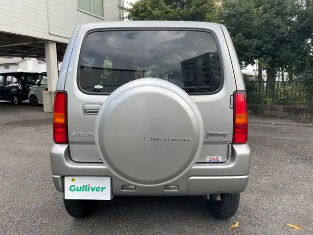 スズキ ジムニー ランドベンチャー 道央・札幌 2014(平26)年 8.7万km スチールシルバーM ワンオーナー/前席シートヒーター/純正メモリナビ/ワンセグTV/CD/純正１６インチアルミホイール/背面タイヤ/ハードカバー/キーレスキー/スペアキー１本/ETC/新車時保証書/取扱説明書