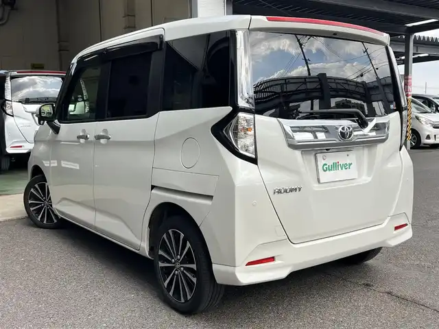 トヨタ ルーミー カスタムG－T 鹿児島県 2022(令4)年 5.5万km パールホワイトⅢ ワンオーナー/純正メモリナビ「NSZT-W68T」/　・DVD・SD・Bluetooth・フルセグTV/パノラミックビューモニター/ビルトインETC/社外前後ドラレコ「コムテック DC-DR652」/純正置くだけ充電/両側パワースライドドア（ウェルカムスイッチあり）/スマートアシスト/　・衝突回避支援ブレーキ/　・車線逸脱警報/　・アダプティブドライビングビーム/　・アダプティブクルーズコントロール/　・コーナーセンサー/純正LEDヘッドライト/純正LEDフォグランプ/オートライト/革巻きステアリング/ステアリングスイッチ/コンフォートパッケージ/　・前席シートヒーター/　・シートバックテーブル/リアサンシェード/純正15インチアルミホイール/電動オート格納ウインカー付ドアミラー/純正フロアマット/純正ドアバイザー/取扱説明書、新車保証書/スペアスマートキーX1本