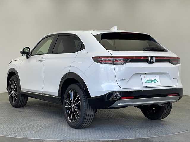 ホンダ ヴェゼル ハイブリッド e:HEV Z 栃木県 2025(令7)年 0.1万km未満 プラチナホワイトパール 登録済未使用車/純正ナビ/（TV/BT）/バックカメラ/ブラインドスポットモニタリング/ホンダセンシング/・衝突軽減ブレーキ/・誤発進抑制機能/・アダプティブクルーズコントロール/・車線維持支援システム/・路外逸脱抑制機能/・先行車発進お知らせ機能/・標識認識機能/・オートハイビーム/・ブラインドスポットインフォメーション/コーナーセンサー/ETC2.0/ハーフレザーシート/シートヒーター/ステアリングヒーター/LEDヘッドライト/スマートキー/プッシュスタート/純正アルミホイールワンオーナー