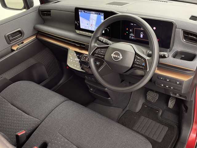 日産 サクラ G 鹿児島県 2023(令5)年 2.4万km スパークリングレッドM スマートキー×2/純正EV専用NissanConnectナビゲーションシステム/アラウンドビューモニター（移動物検知機能付）/前後ドライブレコーダー/プロパイロット/・インテリジェント クルーズコントロール/・ハンドル支援/・VDC（ビークルダイナミクスコントロール/・ABS（アンチロックブレーキシステム）/LEDヘッドライト/LEDポジションランプ（アクセント機能付）/LEDリヤコンビネーションランプ/D席シートヒーター/ステアリングヒーター/充電ケーブル/LEDヘッドライト/コーナーセンサー/純正フロアマット/純正14インチアルミホイール/ビルトインETC2.0