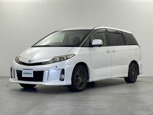 トヨタ エスティマ アエラス 栃木県 2012(平24)年 15.5万km ホワイトパールクリスタルシャイン 純正７インチナビ/（CD/DVD/FM/AM/BT)/バックカメラ/クルーズコントロール/両側パワースライドドア/ドアバイザー/電動格納ミラー/ウインカーミラー/ステアリングリモコン/革巻きステアリング/オットマン/オートエアコン/プッシュスタート/スマートキー/社外１６インチAW