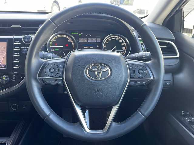 トヨタ カムリ G レザーパッケージ 東京都 2018(平30)年 7万km グラファイトM 純正SDナビ/（フルセグ/BT/CD/DVD/FM/AM）/ドライブレコーダー（前後）/バックカメラ　ETC2.0/ヘッドアップディスプレイ/Toyota Safety Sense P/・LDA・PCS・BSM/・オートマチックハイビーム/・レーダークルーズコントロール/レザーシート/シートヒーター（D/N）/パワーシート（D/N）/オートホールド/コーナーセンサー/スマートキー×２/純正１８インチアルミ/社外AW付スタッドレスタイヤ積載