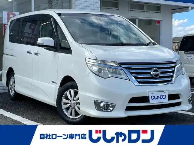 日産 セレナ ハイウェイスター Sハイブリッド 徳島県 2014(平26)年 8.6万km ブリリアントホワイトパール (株)IDOMが運営する【じしゃロン徳島店】の自社ローン専用車両になりますこちらは現金またはオートローンご利用時の価格です。/自社ローンご希望の方は別途その旨お申付け下さい”										/										/										エマージェンシーブレーキ　/レーンキープアシスト/純正８型ナビゲーション　/（フルセグ/CD/DVD/SD/BT)/バックカメラ　/フリップダウンモニター　/社外ドライブレコーダー/クルーズコントロール/ＥＴＣ　/トラクションコントロール/ＬＥＤヘッドライト　/フォグランプ/ウィンカーミラー/革巻きステアリング/クルーズコントロール　/プッシュスタート　/スマートキー　/アイドリングストップ/電動格納ミラー/エコモード切替/Wエアバック/純正フロアマット/サイドバイザー