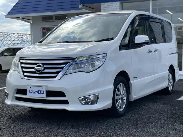 日産 セレナ ハイウェイスター Sハイブリッド 徳島県 2014(平26)年 8.6万km ブリリアントホワイトパール (株)IDOMが運営する【じしゃロン徳島店】の自社ローン専用車両になりますこちらは現金またはオートローンご利用時の価格です。/自社ローンご希望の方は別途その旨お申付け下さい”										/										/										エマージェンシーブレーキ　/レーンキープアシスト/純正８型ナビゲーション　/（フルセグ/CD/DVD/SD/BT)/バックカメラ　/フリップダウンモニター　/社外ドライブレコーダー/クルーズコントロール/ＥＴＣ　/トラクションコントロール/ＬＥＤヘッドライト　/フォグランプ/ウィンカーミラー/革巻きステアリング/クルーズコントロール　/プッシュスタート　/スマートキー　/アイドリングストップ/電動格納ミラー/エコモード切替/Wエアバック/純正フロアマット/サイドバイザー