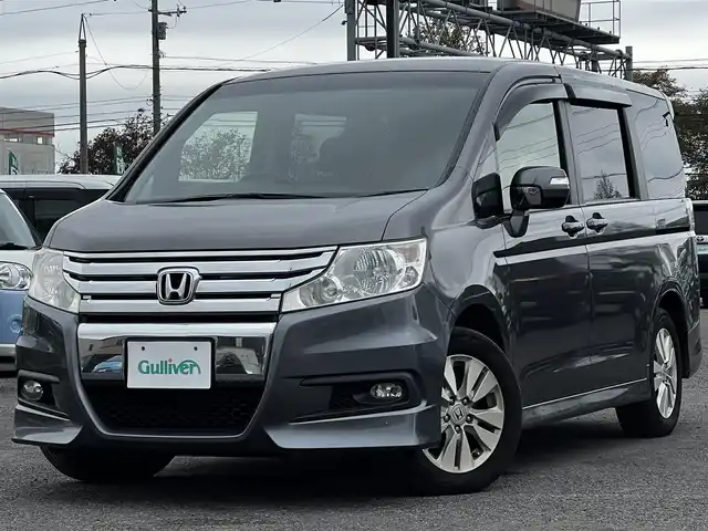 ホンダ ステップワゴン スパーダ Z 道央・札幌 2011(平23)年 14.3万km ポリッシュドメタルメタリック ４WD/ワンオーナー/寒冷地仕様/純正HDDナビ/AM/FM/DVD/CD/ワンセグ/純正フリップダウンモニター/横滑り防止装置/バックカメラ/ビルトインETC/ワイパーデアイサー/ECON/両側パワースライドドア/革巻きステアリング/ステアリングリモコン/パドルシフト/MTモード付AT/スマートキー/ハロゲンヘッドライト/オートライト/フォグランプ/電動格納ミラー/ヒーテッドドアミラー/ウィンカーミラー/純正フロアマット/ドアバイザー/スペアキー/社外エンジンスターター/社外AW付冬タイヤ積込/205/65/R15/2022年/山7mm