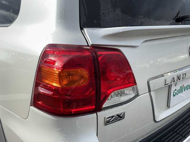 トヨタ ランドクルーザー ZX 新潟県 2015(平27)年 13万km ホワイトパールクリスタルシャイン 社外ホイール24インチ〈LOWENHATT] /社外エアロ〈branew〉/サンルーフ/クルーズコントロール/ルーフレール/シートメモリー/全席シートヒーター/本革レザーシート/自動防眩ミラー/後席モニター/純正フロアマット/ウッドコンビステアリング/フォグランプ/バックカメラ/フルセグ/ビルトインETC/４WD/カーテンエアバック/スマートキー/WACエアコン