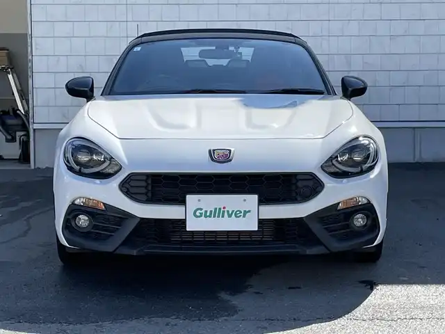 アバルト １２４ スパイダー 群馬県 2018(平30)年 1.9万km 白 純正７インチＳＤナビ　　/フルセグ　/バックカメラ/ＡＢＡＲＴＨ赤レザーシート　/シートヒーター　/前方ドラレコ　/赤キャリパー　/本革ステアリング　/純正フロアマット　/クルーズコントロール　/純正ビルトインＥＴＣ/Bluetooth/純正17インチアルミホイール/フロント・リアフォグランプ/オートLEDヘッドライト