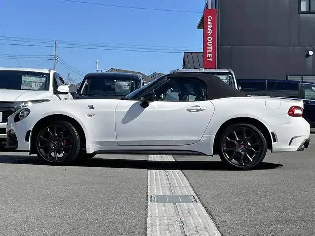 アバルト １２４ スパイダー 群馬県 2018(平30)年 1.9万km 白 純正７インチＳＤナビ　　/フルセグ　/バックカメラ/ＡＢＡＲＴＨ赤レザーシート　/シートヒーター　/前方ドラレコ　/赤キャリパー　/本革ステアリング　/純正フロアマット　/クルーズコントロール　/純正ビルトインＥＴＣ/Bluetooth/純正17インチアルミホイール/フロント・リアフォグランプ/オートLEDヘッドライト