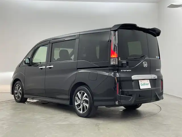 ホンダ ステップワゴン スパーダ ホンダセンシング 神奈川県 2017(平29)年 7.6万km プレミアムスパークルブラックパール 純正ナビ　フリップダウンモニター　バックカメラ　ビルトインＥＴＣ　アダクティブクルーズコントロール　両側パワースライドドア　純正アルミホイール　オートライト　ＬＥＤヘッドライト　地デジフルセグ