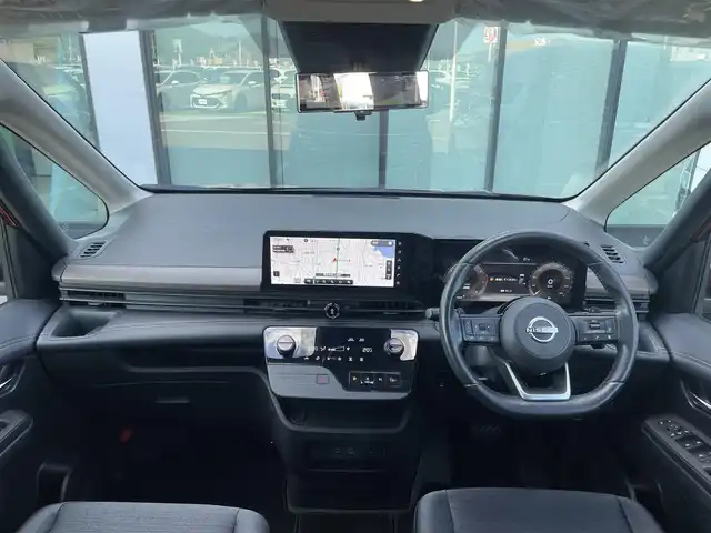 日産 セレナ ハイウェイスター V 香川県 2023(令5)年 1.7万km 赤 登録時走行距離：16792km/純正9型ナビゲーション/【AM/FM/TV/HDMI】/アラウンドビューモニター/衝突被害軽減ブレーキ/LDW（車線逸脱警報）/踏み間違い衝突防止アシスト/ふらつき警報/横滑り防止装置/プロパイロット（ACC）/クリアランスソナー（前後）/ビルトインETC2.0/LEDオートライト/フォグランプ/純正16インチアルミホイール/オートホールド付きブレーキ/後席サンシェード/パーソナルテーブル（2列目・3列目）/スペアキー/スマートキー/プッシュスタート