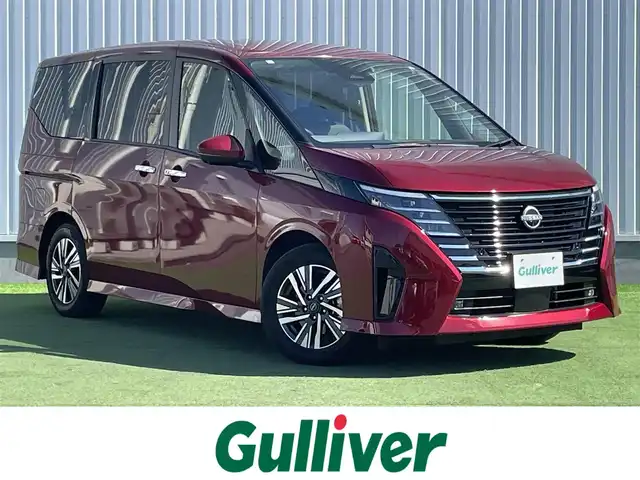 日産 セレナ ハイウェイスター V 香川県 2023(令5)年 1.7万km 赤 登録時走行距離：16792km/純正9型ナビゲーション/【AM/FM/TV/HDMI】/アラウンドビューモニター/衝突被害軽減ブレーキ/LDW（車線逸脱警報）/踏み間違い衝突防止アシスト/ふらつき警報/横滑り防止装置/プロパイロット（ACC）/クリアランスソナー（前後）/ビルトインETC2.0/LEDオートライト/フォグランプ/純正16インチアルミホイール/オートホールド付きブレーキ/後席サンシェード/パーソナルテーブル（2列目・3列目）/スペアキー/スマートキー/プッシュスタート