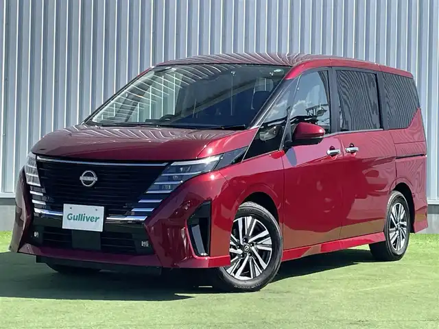 日産 セレナ ハイウェイスター V 香川県 2023(令5)年 1.7万km 赤 登録時走行距離：16792km/純正9型ナビゲーション/【AM/FM/TV/HDMI】/アラウンドビューモニター/衝突被害軽減ブレーキ/LDW（車線逸脱警報）/踏み間違い衝突防止アシスト/ふらつき警報/横滑り防止装置/プロパイロット（ACC）/クリアランスソナー（前後）/ビルトインETC2.0/LEDオートライト/フォグランプ/純正16インチアルミホイール/オートホールド付きブレーキ/後席サンシェード/パーソナルテーブル（2列目・3列目）/スペアキー/スマートキー/プッシュスタート