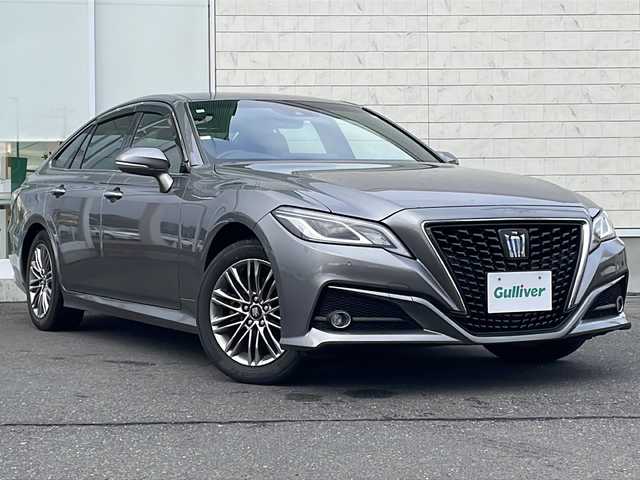 トヨタ クラウン ハイブリッド S Four 岩手県 2021(令3)年 6万km グレー ボディーカラー：特別設定色プレシャスメタル〈1L5〉/4WD/純正ナビ(CD/DVD/SD/ラジオ/Bluetooth)/フルセグテレビ/バックカメラ/プリクラッシュセーフティ/レーンディパーチャーアラート/レーダークルーズコントロール/オートハイビーム/ブラインドスポットモニター/ハーフレザーシート/前席シートヒーター/前席パワーシート/ビルトインETC(2.0)/AC100V電源/コーナーセンサー/リアサンシェード/純正17inアルミホイール/純正フロアマット/スマートキー（×2）/ステアリングスイッチ/ドアバイザー/保証書