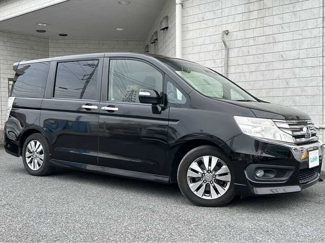 ホンダ ステップワゴン スパーダ Z 神奈川県 2013(平25)年 10.5万km プレミアムスパークルブラックパール 純正9インチSDナビ/【CD/DVD/SD/フルセグTV/BT】/バックカメラ/フリップダウンモニター/純正16インチAW/両側パワースライドドア/アイドリングストップ/パドルシフト/ステアリングスイッチ/ビルトインETC/純正フロアマット/スマートキー/スペアキー/新車時保証書/取扱説明書