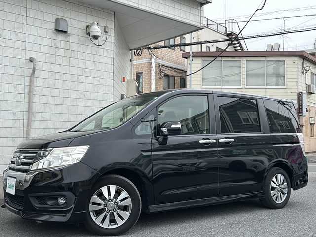 ホンダ ステップワゴン スパーダ Z 神奈川県 2013(平25)年 10.5万km プレミアムスパークルブラックパール 純正9インチSDナビ/【CD/DVD/SD/フルセグTV/BT】/バックカメラ/フリップダウンモニター/純正16インチAW/両側パワースライドドア/アイドリングストップ/パドルシフト/ステアリングスイッチ/ビルトインETC/純正フロアマット/スマートキー/スペアキー/新車時保証書/取扱説明書