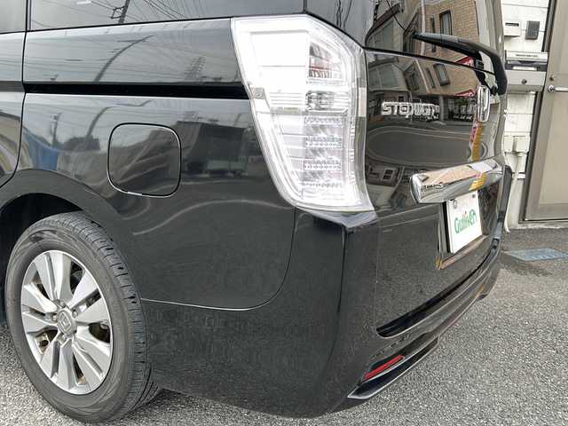 ホンダ ステップワゴン スパーダ Z 神奈川県 2013(平25)年 10.5万km プレミアムスパークルブラックパール 純正9インチSDナビ/【CD/DVD/SD/フルセグTV/BT】/バックカメラ/フリップダウンモニター/純正16インチAW/両側パワースライドドア/アイドリングストップ/パドルシフト/ステアリングスイッチ/ビルトインETC/純正フロアマット/スマートキー/スペアキー/新車時保証書/取扱説明書