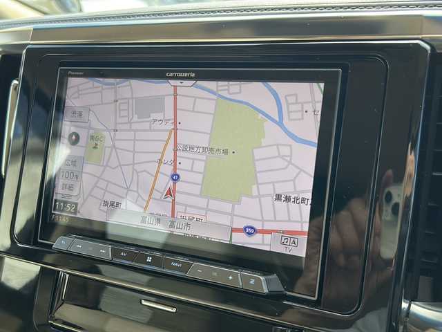 トヨタ ヴェルファイア ハイブリット X 富山県 2019(令1)年 6.7万km ブラック ワンオーナー/両側パワスラ/スマートキー×２/社外メモリーナビ(AVIC-CL902)/DVD/BT/USB/フルセグTV/ビルトインETC/ミラー型前後ドラレコ/社外フリップダウンモニター(TVM-FW1020)/LEDヘッドライト/フォグ/プッシュスタート/衝突安全ブレーキ/レーンキープアシスト/オートハイビーム/レーダークルコン/電動Pブレーキ/電格ウィンカーミラー/シートカバー/Clazzioフロアマット/電動Pブレーキ/皮巻きステアリング/ステアリングスイッチ/AC100V電源/保証書・取説・ナビ取説