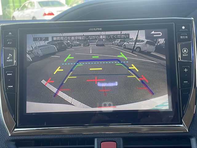トヨタ ヴォクシー ハイブリッド V 茨城県 2015(平27)年 8.5万km ホワイトパールクリスタルシャイン 社外SDナビ(Bluetooth/バックカメラ/フルセグTV/CD/DVD)/ETC/LEDオートライト/シートヒーター/USB入力端子/スマートキー/両側パワースライドドア/3列シート/純正フロアマット/冷房WAC/15インチ純正アルミホイール