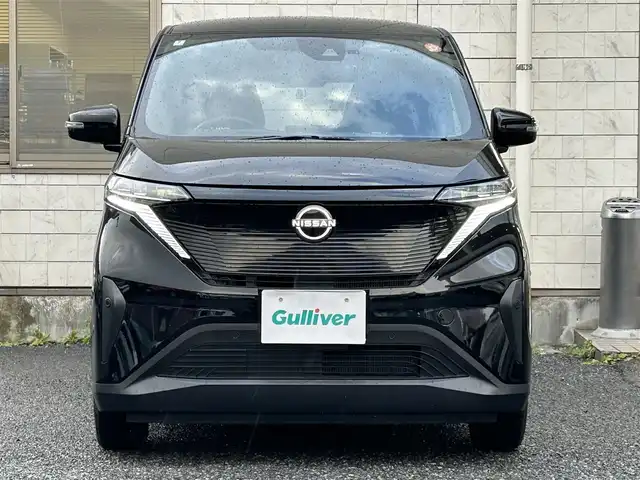 日産 サクラ X 福岡県 2022(令4)年 1.3万km ブラック ワンオーナー車/KENWOOD 9インチナビ【MDF-M910HDF】/（FM/AM/CD/DVD/Bluetooth/フルセグＴＶ）/運転支援/・車線逸脱警報/・踏み間違い衝突防止/・先行車発進お知らせ/・速度/道路標識表示/・フロント/リヤソナー/・ふらつき警報/横滑り防止/オートライト/ハイビームアシスト/純正14インチアルミホイール/コムテック前後ドライブレコーダー【ZDR035】/ビルトインＥＴＣ/e-Pedal Step/ドライブモードセレクター/純正フロアマット/純正ドアバイザー/電動パーキングブレーキ/プッシュスタート/充電ケーブル/スペアキー×1/アクセサリーソケット/ISOFIX/保証書/取扱説明書