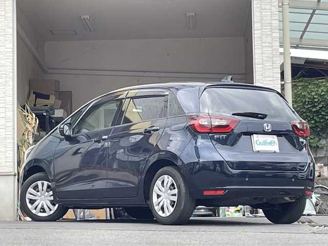 ホンダ フィット e:HEVホーム 大分県 2022(令4)年 2.5万km ミッドナイトブルービームM 純正ナビ/フルセグTV/Bluetooth/純正フロアマット/純正ドラレコ/純正LEDヘッドライト/オートライト/社外ETC/コーナーセンサー/レーンキープアシスト/衝突被害軽減ブレーキ/バックカメラ/スマートキー/クルーズコントロール