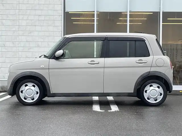 スズキ ラパン S 宮崎県 2017(平29)年 3.5万km フォーンベージュM ワンオーナー/純正8型ナビ/　(Bluetooth/CD/DVD)/フルセグTV/全方位モニター/横滑り防止装置/HIDヘッドランプ/オートライト/本革巻きステアリング/ステアリングスイッチ/前席シートヒーター/キーレスプッシュスタートシステム/禁煙車