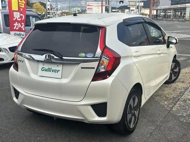 ホンダ フィット ハイブリット Lパッケージ 京都府 2016(平28)年 2.4万km プレミアムホワイトパールⅡ  シティブレーキシステム/ LEDヘッドライト/ ハーフレザー/ クルーズコントロール/ 社外SDナビ　フルセグ/ バックカメラ/ BTオーディオ/ ホンダスマートキー　スペアキーあり/ ウィンカーミラー/ 車検R9.4.20/ 登録時走行距離　23349キロ