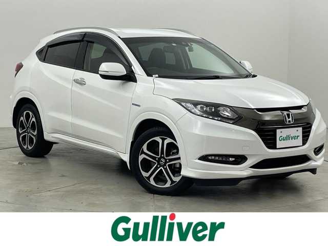 ホンダ ヴェゼル ハイブリッド Z ホンダセンシング 福岡県 2018(平30)年 5万km ホワイトオーキッドパール 純正ナビ（フルセグＴＶ）　/バックカメラ　/ビルトインＥＴＣ　/前後ドラレコ　/アダプティブクルコン　/衝突被害軽減ブレーキ　/レーンキープ　/パドルシフト　/ハーフレザー　/シートヒーター　/純正１７インチＡＷ　/ＬＥＤ