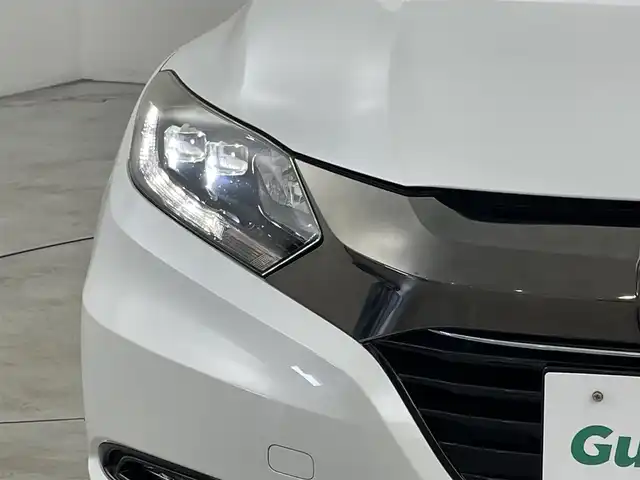 ホンダ ヴェゼル ハイブリッド Z ホンダセンシング 福岡県 2018(平30)年 5万km ホワイトオーキッドパール 純正ナビ（フルセグＴＶ）　/バックカメラ　/ビルトインＥＴＣ　/前後ドラレコ　/アダプティブクルコン　/衝突被害軽減ブレーキ　/レーンキープ　/パドルシフト　/ハーフレザー　/シートヒーター　/純正１７インチＡＷ　/ＬＥＤ