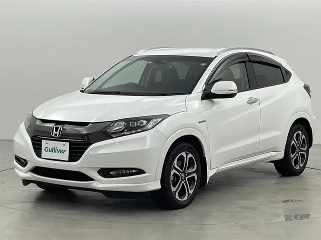 ホンダ ヴェゼル ハイブリッド Z ホンダセンシング 福岡県 2018(平30)年 5万km ホワイトオーキッドパール 純正ナビ（フルセグＴＶ）　/バックカメラ　/ビルトインＥＴＣ　/前後ドラレコ　/アダプティブクルコン　/衝突被害軽減ブレーキ　/レーンキープ　/パドルシフト　/ハーフレザー　/シートヒーター　/純正１７インチＡＷ　/ＬＥＤ